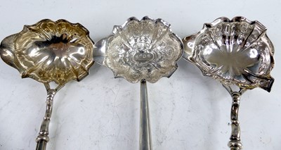 Lot 2075 - Three Georgian silver bowled and turned wooden...