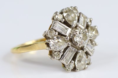 Lot 2709 - A yellow and white metal diamond cocktail ring,...