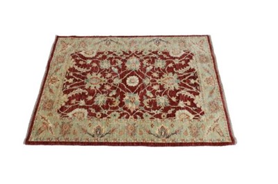 Lot 1144 - A Ferahagn rug, with four-point floral motif...