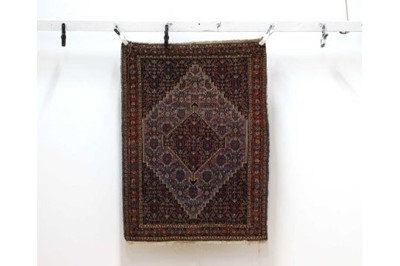 Lot 1134 - A Persian Hamadan carpet, semi-antique,...
