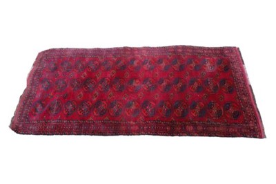 Lot 1139 - An Afghan rug, with repeating medallion to the...