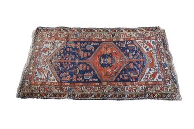 Lot 1131 - A Persian Malayer rug with red ground and...