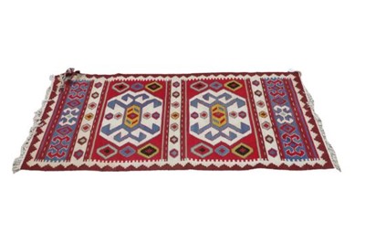 Lot 1136 - A Kilim runner, modern, with four...