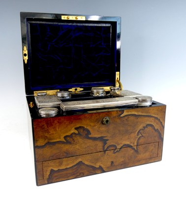 Lot 2331 - A Victorian figured walnut dressing toilet box...