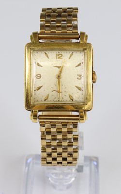 Lot A yellow metal Longines manual wind wristwatch,...