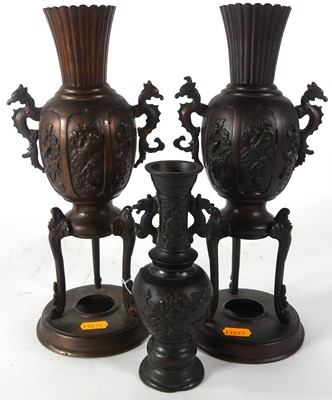 Lot 259 - A pair of oriental bronzed vases height 33 c.m...