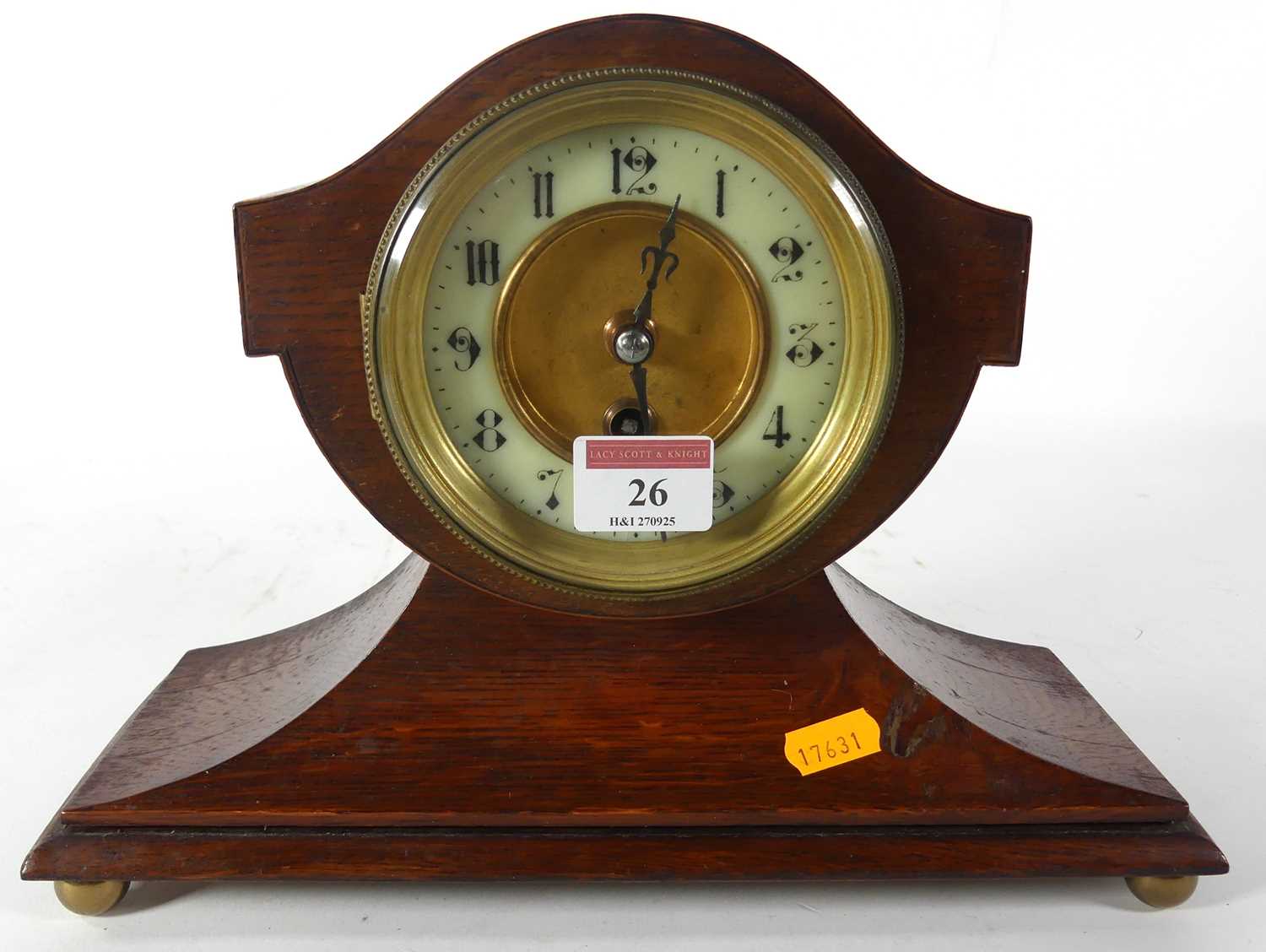 Lot 26 - An oak cased mantel clock, h.23cm