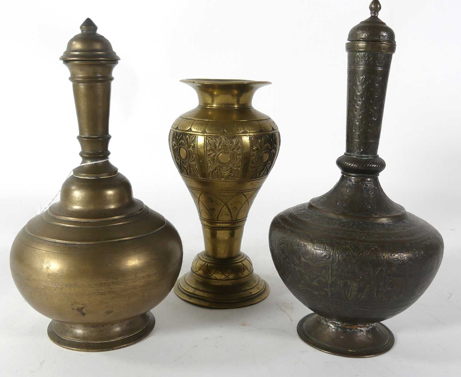 Lot 28 - An Indian etched brass Surahi; together with...