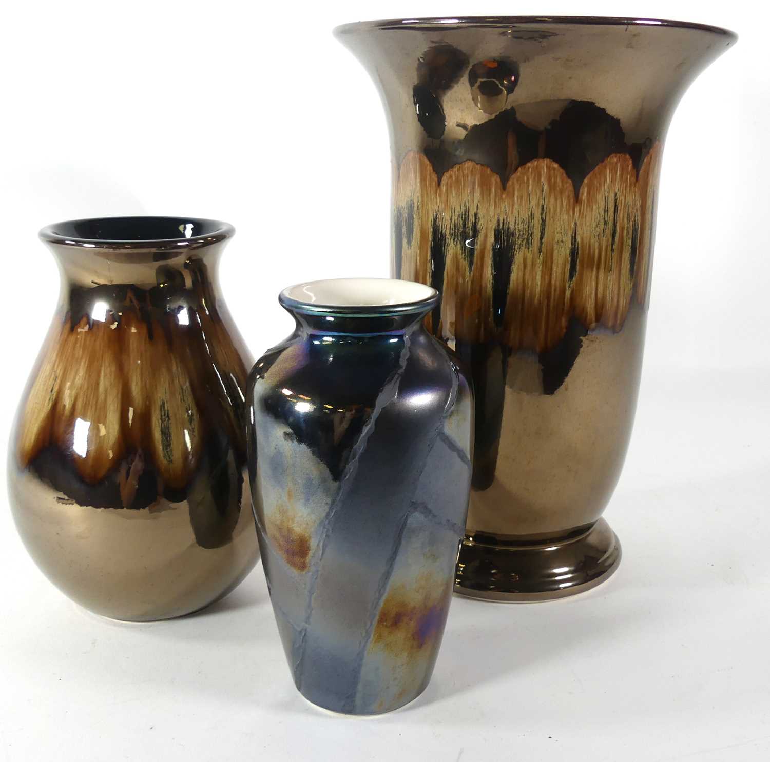 Lot 29 - Three Poole Pottery vases, the tallest h.33cm