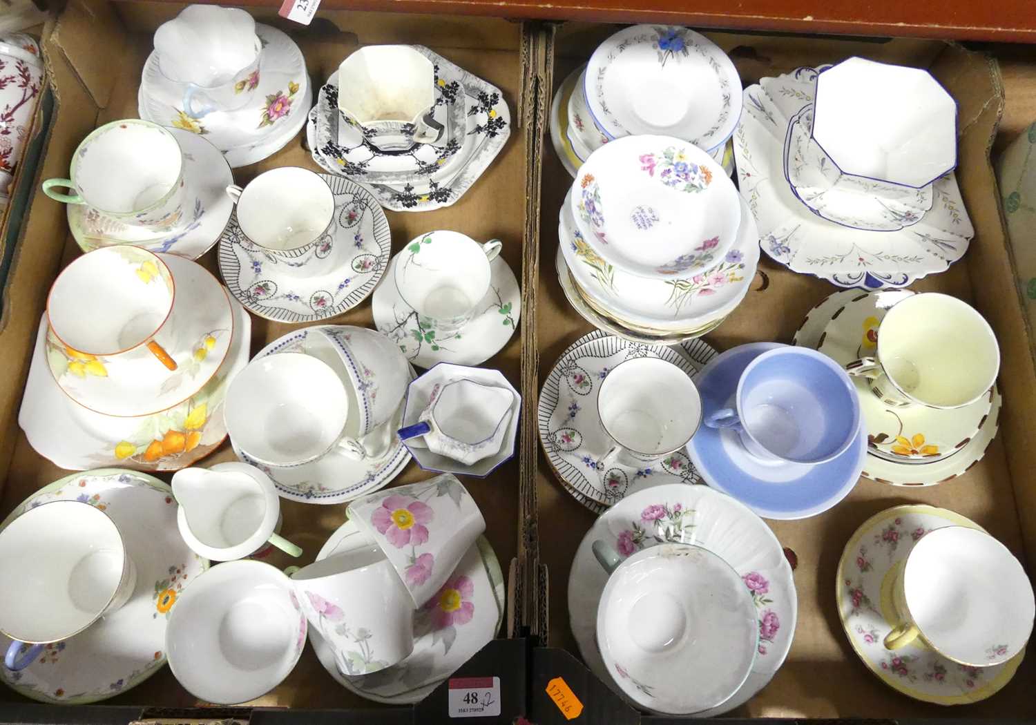 Lot 48 - Two trays of ceramics, to include cups,...