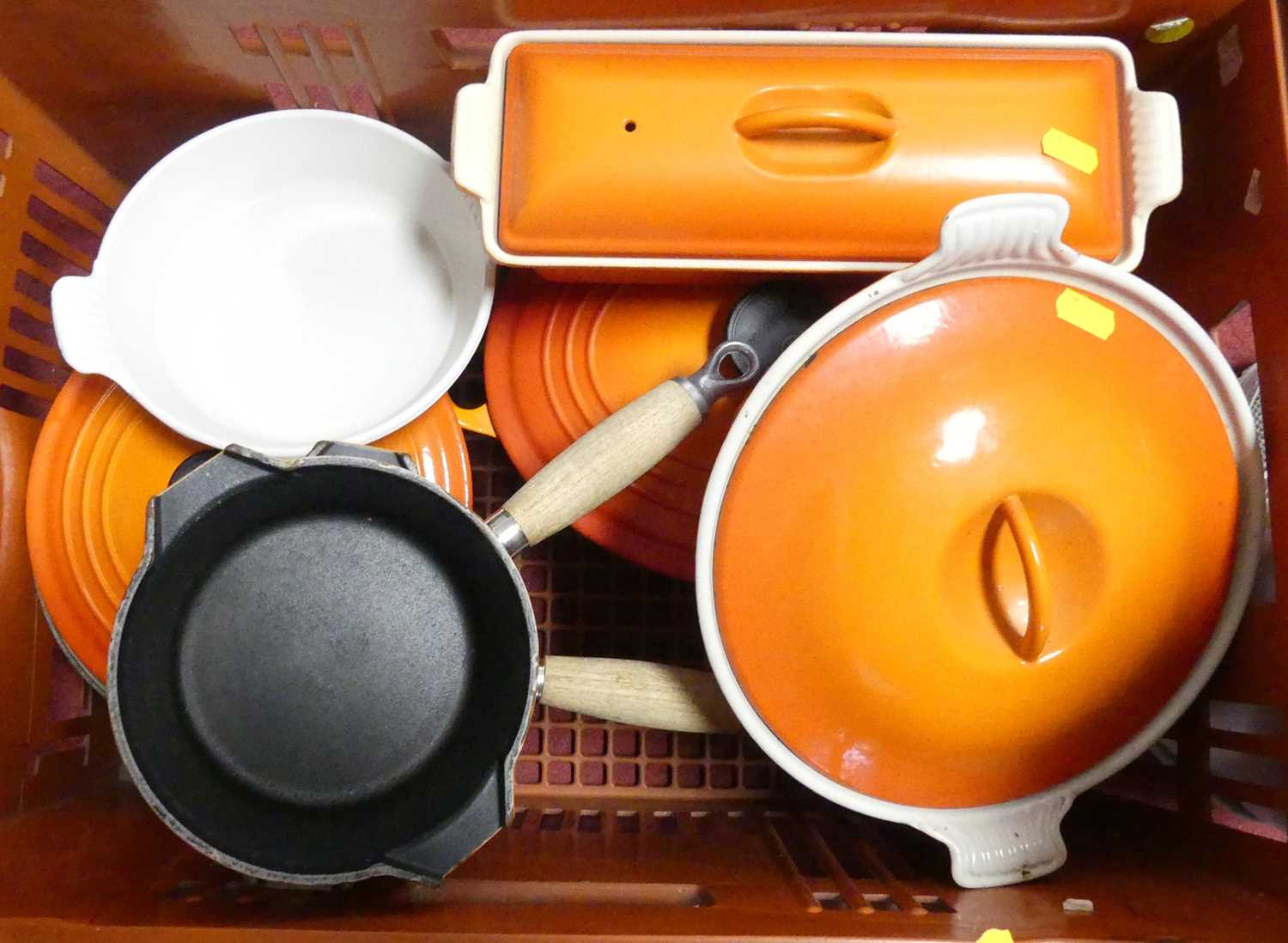 Lot 68 - A collection of Le Creuset burnt orange wares,...