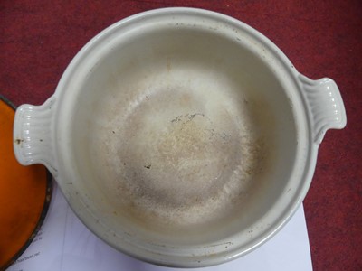 Lot 68 - A collection of Le Creuset burnt orange wares,...