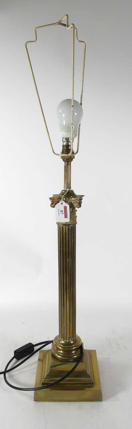 Lot 87 - A standard lamp on brass column, h.62cm...