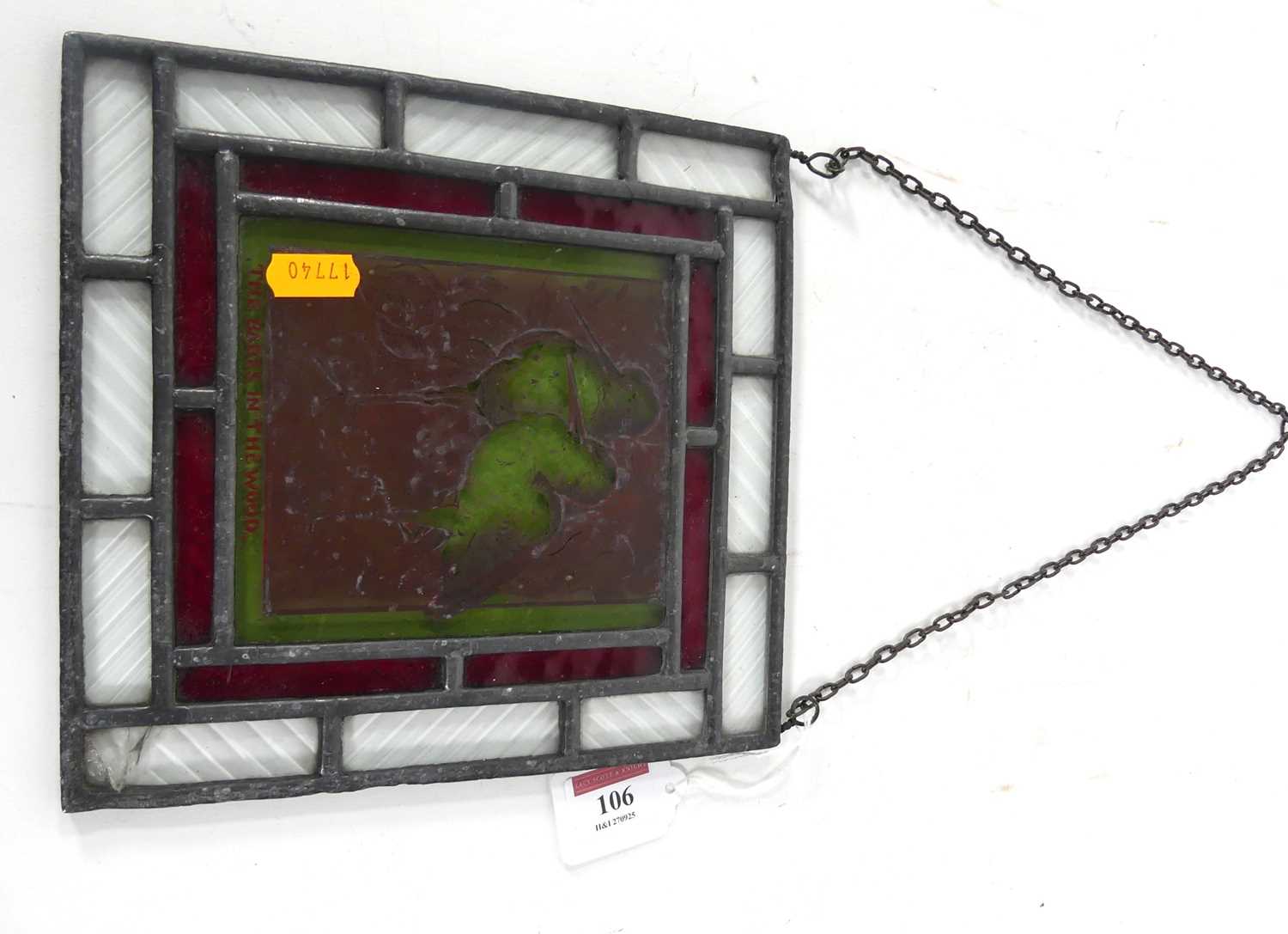 Lot 106 - A leaded stained glass panel, with two storks...