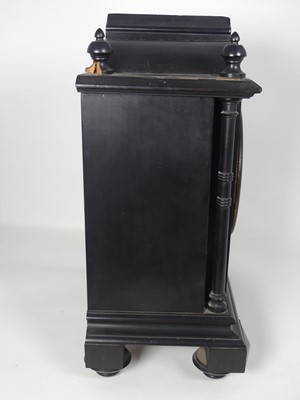 Lot 109 - An Aesthetic Movement ebonised mantel clock, h....