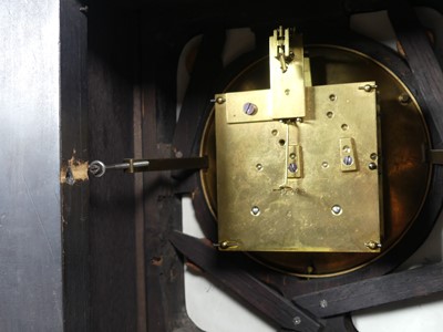 Lot 109 - An Aesthetic Movement ebonised mantel clock, h....