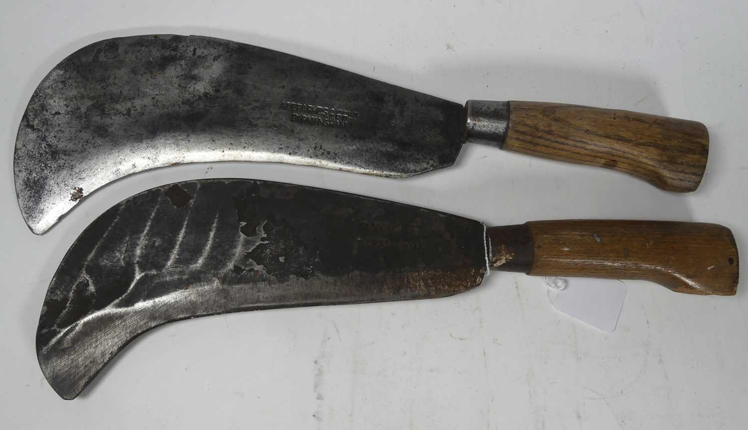 Lot 114 - Two vintage bill hooks, one marked ARF Parks &...