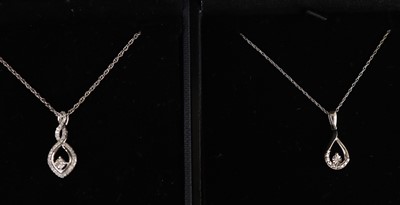 Lot 319 - A silver and diamond pendant necklace, the...