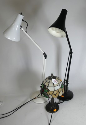 Lot 125 - A pair of black and white anglepoise lamps;...