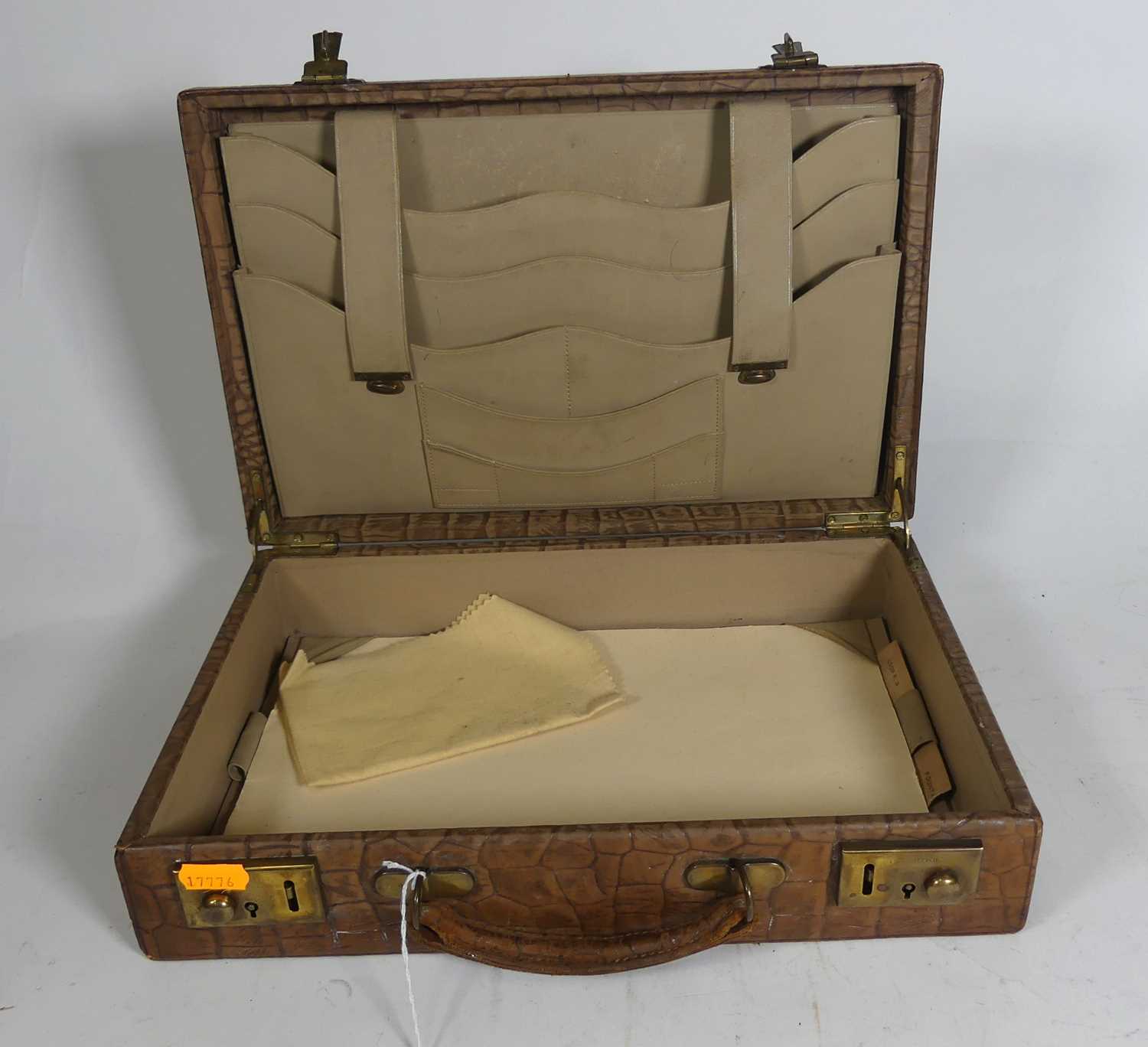 Lot 126 - A crocodile skin writing case, w.35cm