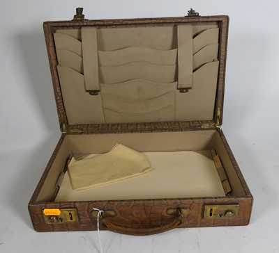 Lot 126 - A crocodile skin writing case, w.35cm