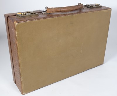 Lot 126 - A crocodile skin writing case, w.35cm