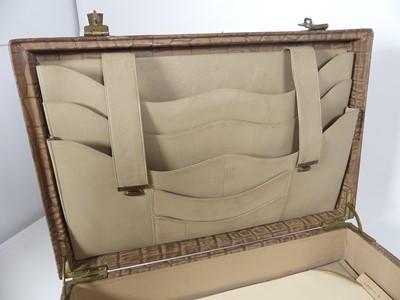 Lot 126 - A crocodile skin writing case, w.35cm