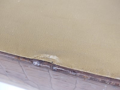 Lot 126 - A crocodile skin writing case, w.35cm