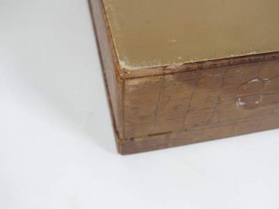 Lot 126 - A crocodile skin writing case, w.35cm