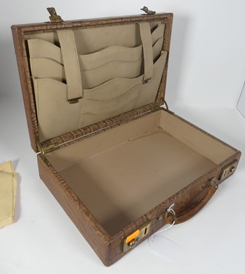 Lot 126 - A crocodile skin writing case, w.35cm
