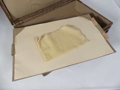 Lot 126 - A crocodile skin writing case, w.35cm