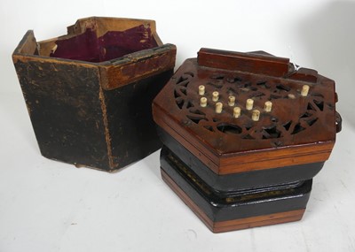 Lot 124 - A 19th century hand-held concertina, in fitted...