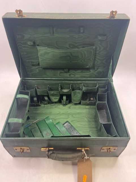 Lot 111 - A green leather travel trunk marked Asprey...