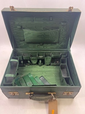 Lot 111 - A green leather travel trunk marked Asprey...