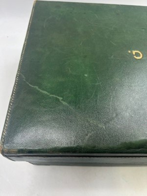 Lot 111 - A green leather travel trunk marked Asprey...