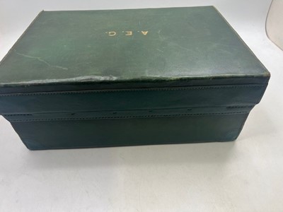 Lot 111 - A green leather travel trunk marked Asprey...