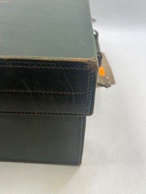 Lot 111 - A green leather travel trunk marked Asprey...