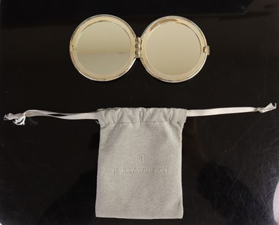 Lot 327 - Harry Winston: an unmarked white metal double...