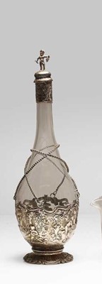 Lot 186 - A Victorian white metal mounted decanter, with...