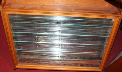 Lot 1549 - Two hardwood glazed front display cabinets