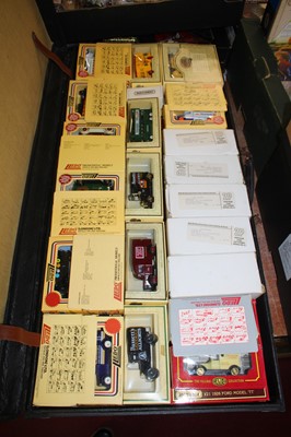 Lot 1600 - A black leather suitcase containing a quantity...