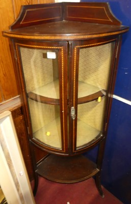 Lot 1105 - An Edwardian beech and chequer inlaid bowfront...