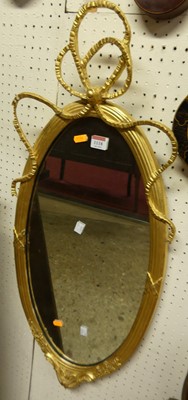 Lot 1118 - A 19th century French giltwood oval wall...