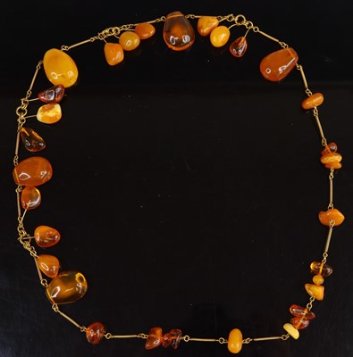 Lot 318 - A gilt metal and multi-amber set necklace, to...