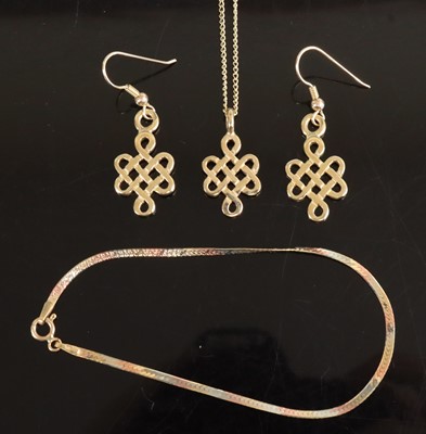 Lot 342 - A pair of Celtic 9ct gold earrings on shepherd'...