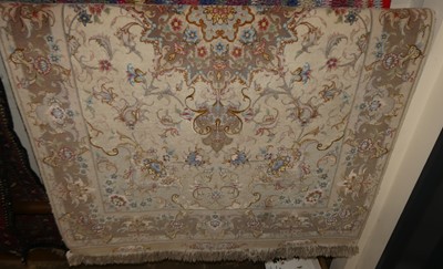 Lot 1126 - A Persian finely knotted pale ground Tabriz...