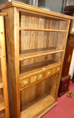 Lot 1147 - A contemporary hardwood freestanding open...