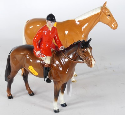 Lot 152 - A Beswick model of a huntsman on horseback;...