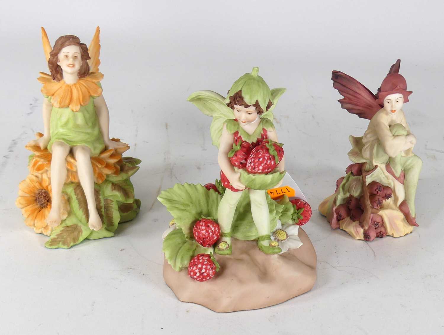 Lot 153 - A collection of three Danbury Mint fairies, to...