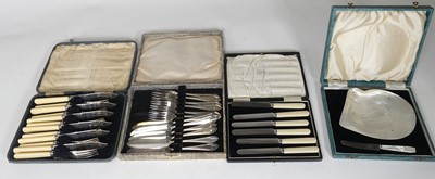 Lot 202 - Four boxed cutlery sets, to include silver...